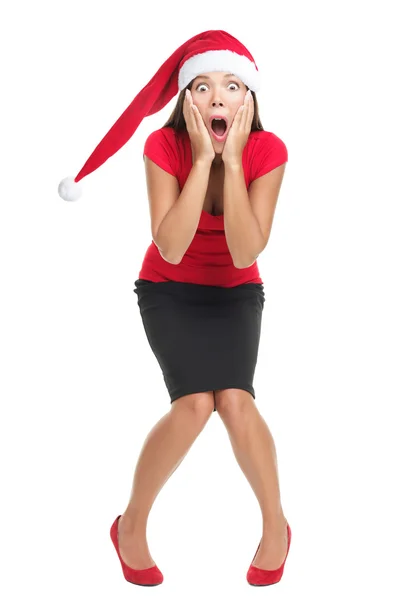 Mujer con sombrero de santa sorprendido —  Fotos de Stock