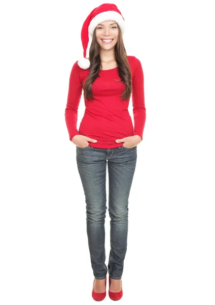 Χριστούγεννα γυναίκα να στέκεται με καπέλο Santa — Φωτογραφία Αρχείου