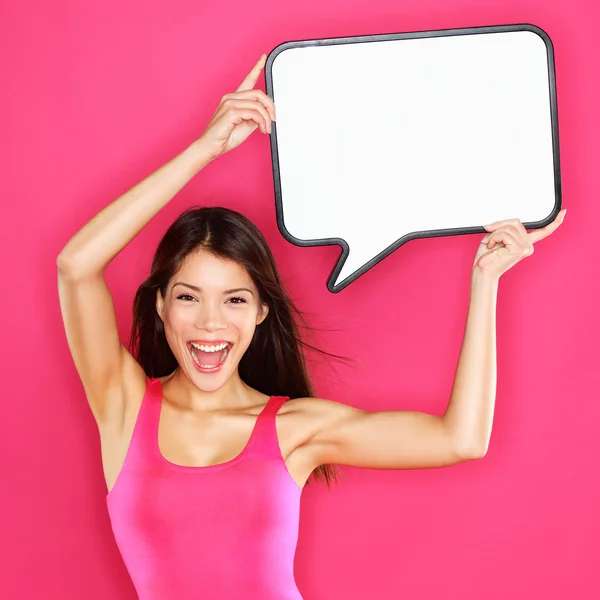 Frau zeigt Zeichen einer Sprechblase Stockfoto