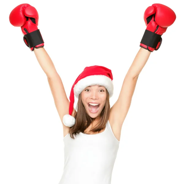 Woman wearing boxing gloves celebrating Stock Photo