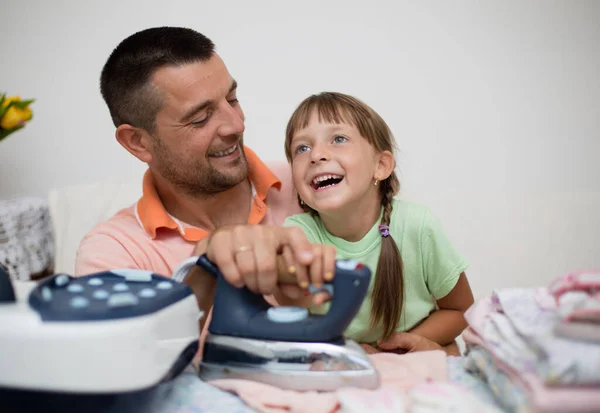 Father Little Daughter Ironing Kids Clothes Home Domestic Concept — стоковое фото