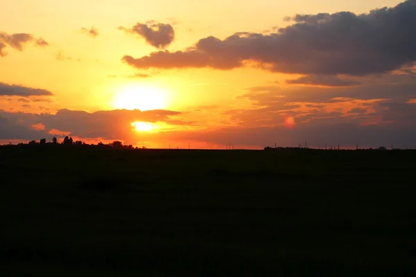 Ciel orangé coucher de soleil Photos De Stock Libres De Droits