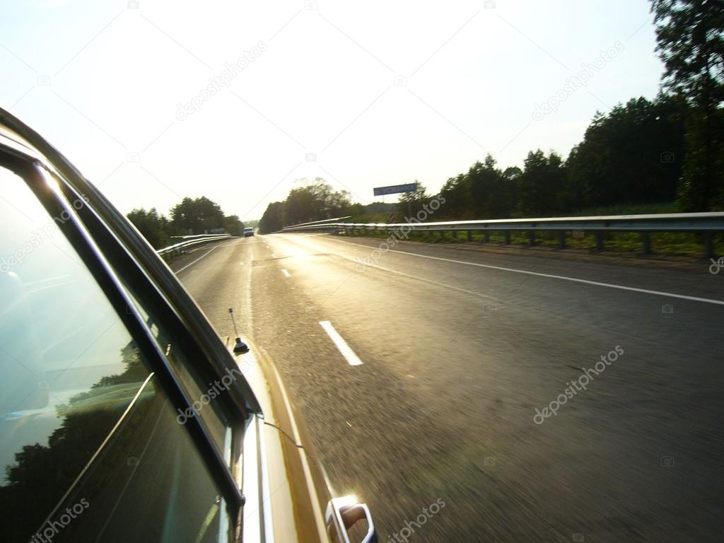 Rear view to running back road from oldtimer