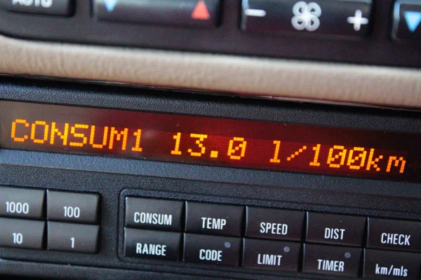 Average fuel consumption on Car board computer display — Stock Photo, Image