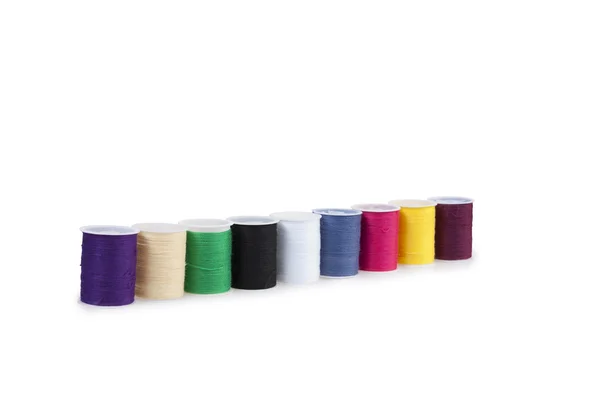 Threads standing in a row — Stock Photo, Image