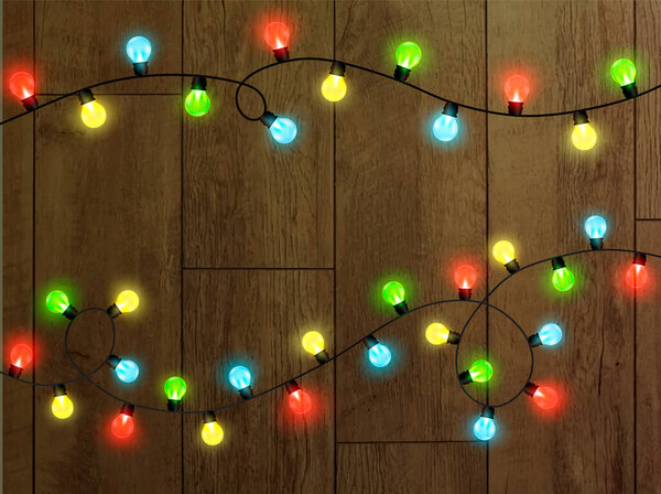 Christmas lights on a transparent background. Garland shining with Christmas lights. Festive decoration element.Bright Christmas lights. The garland is multi-colored. Isolated. Vector illustration.