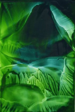 Mürekkep, sıcak balmumu yeşili soyut arka plana benziyor. Mağara, insan, dalgalar, çimenler. Zümrüt yeşil.