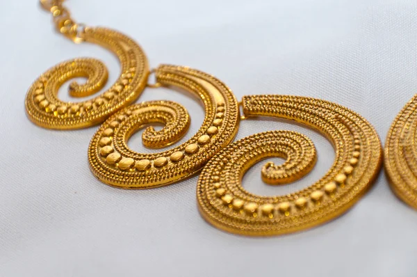 Gold necklace spiral — Stock Photo, Image