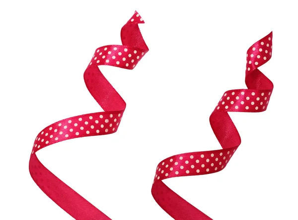 Pink silk polka dot twisted ribbons — Stock Photo, Image