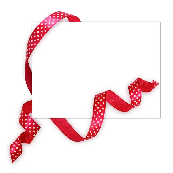 Pink silk polka dot ribbon and a card — Stock Photo, Image