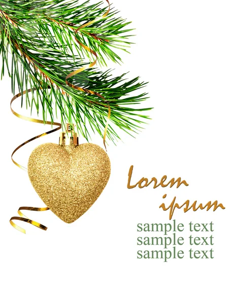 Vánoční roh dekorace větvičky borovice a zlaté srdce — Stock fotografie