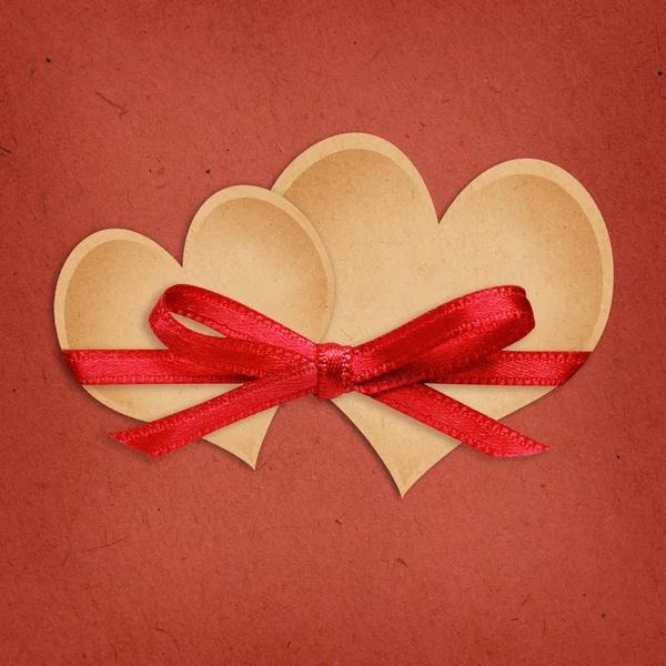 Craft paper hearts tied with ribbon — Stock Photo, Image
