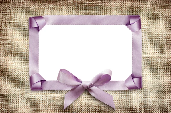 Satin frame and bow — Stock Photo, Image