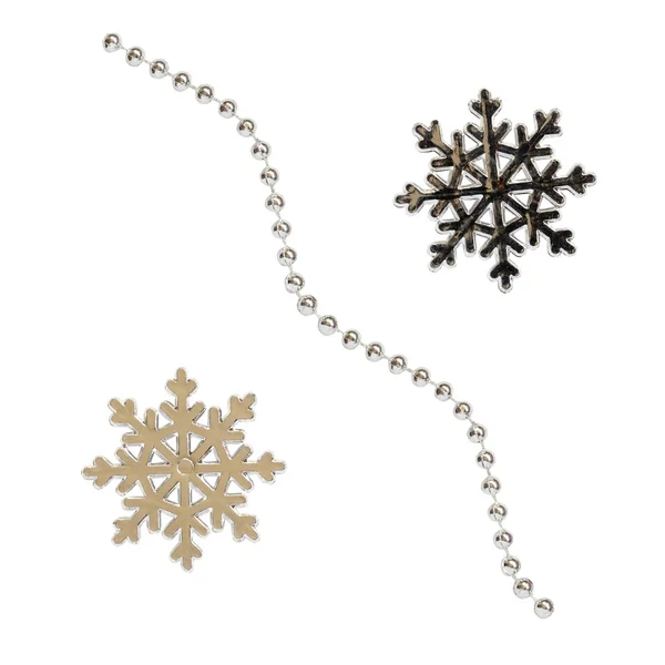 Snowflakes and decoration beads — Stock Photo, Image