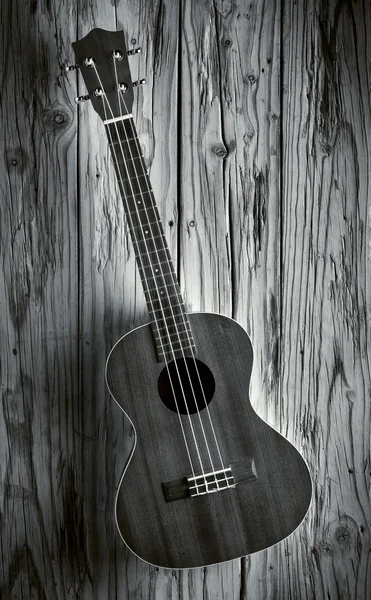 Ukulele on wood background — Stock Photo, Image