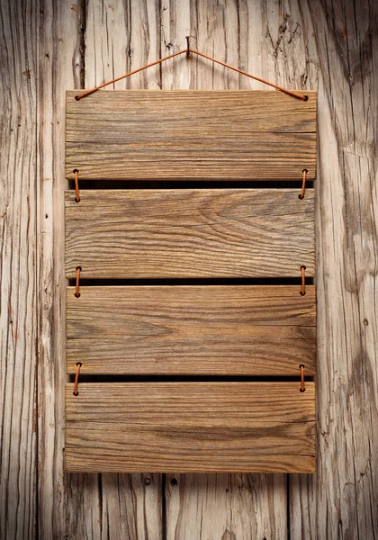 Menu bestuur in verouderde houten muur — Stockfoto