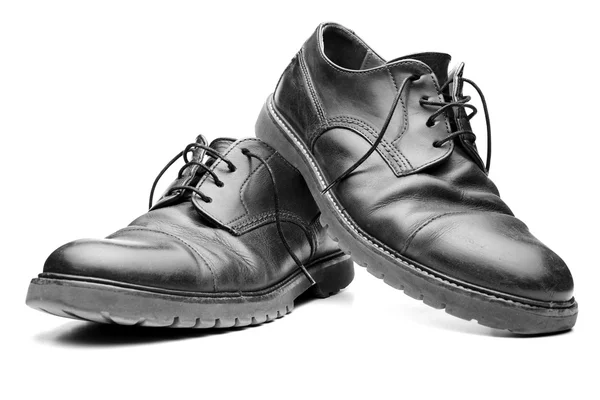 Gamla svarta skor — Stockfoto