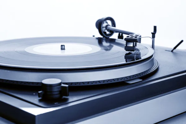 Vintage turntable playing a record — Stock Photo, Image