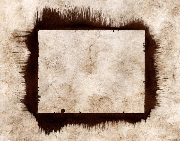old and grunge textured paper with brown ink frame
