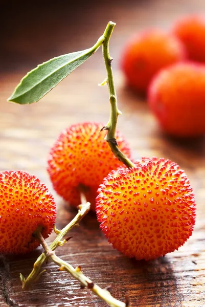 Arbutus Berries Aged Wood Table — Stock Photo, Image