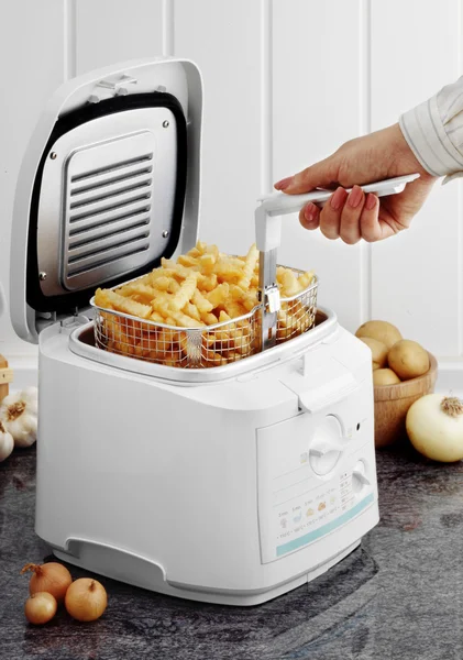 Frying potatoes — Stock Photo, Image