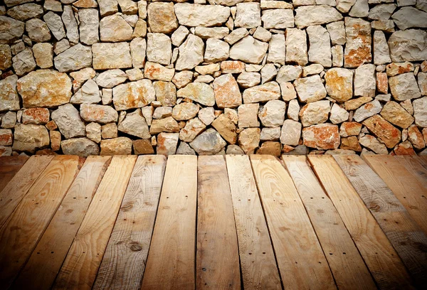 Wooden slats with stone wall — Stock Photo, Image