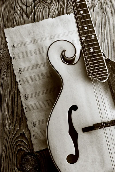 Mandolin with music sheet — Stock Photo, Image