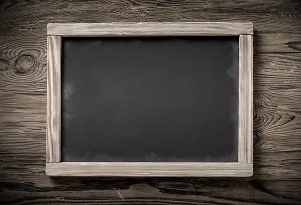 Horizontale schoolbord op leeftijd donker hout — Stockfoto