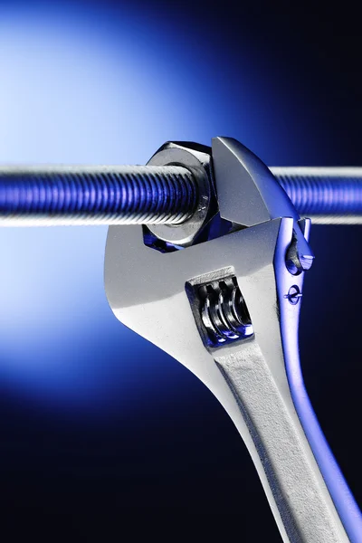 Spanner with screw and nut — Stock Photo, Image