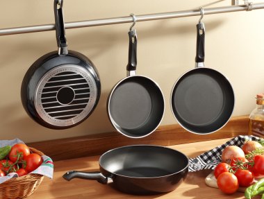 set of black frying pans clipart