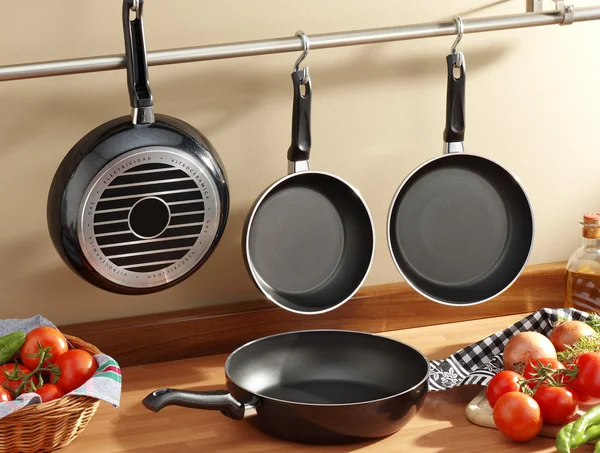 Set of black frying pans 图库图片