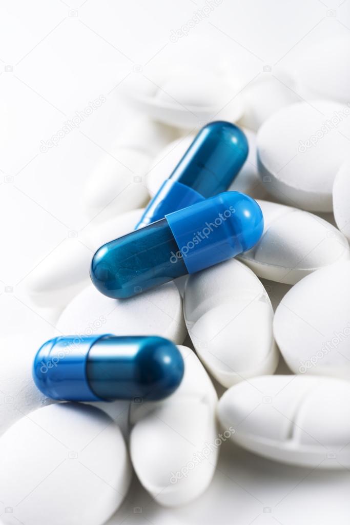 blue pills and white tablets