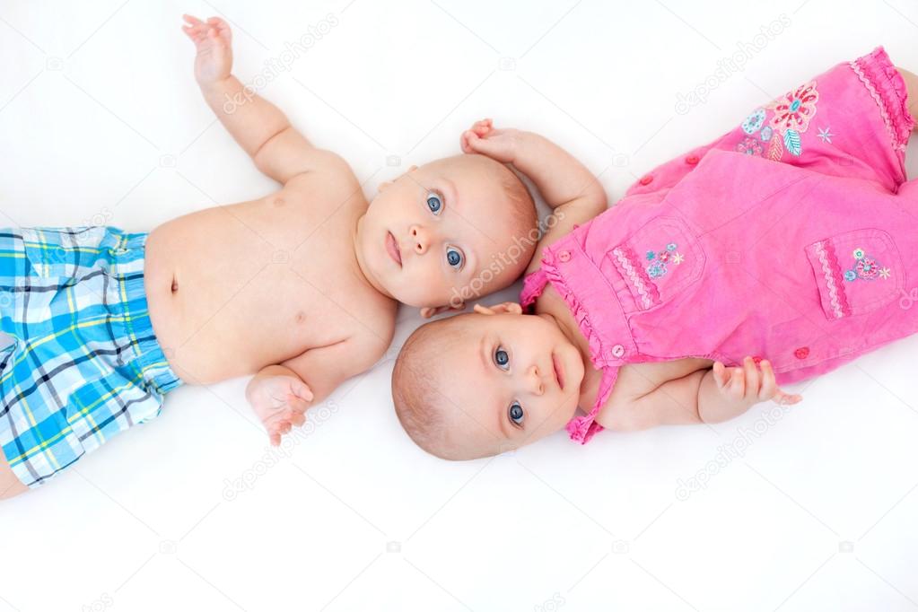 Two happy child on a white background