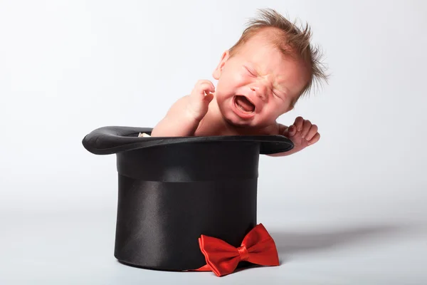 Söta söta baby i silk hatten — Stockfoto