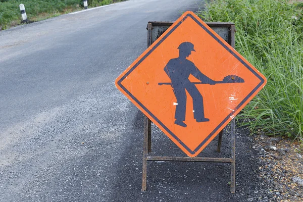 Under konstruktion tecken på skada road — Stockfoto