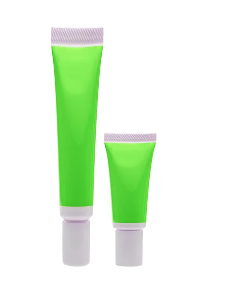 Na białym tle zielony kosmetycznych tube — Zdjęcie stockowe