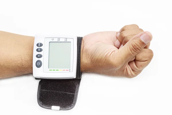 Blood pressure on patient wrist Royalty Free Stock Photos