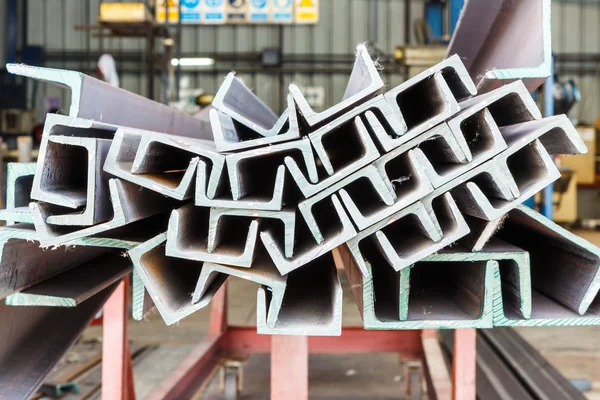 Heap of U shape beam steel in factory shelf — Stock Photo, Image