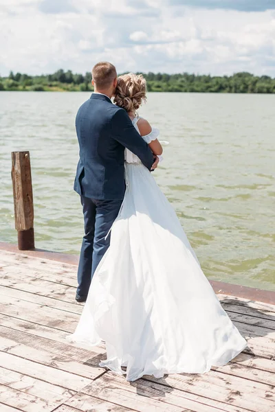 Bride Groom Embrace Pier Background Lake — Stock Photo, Image