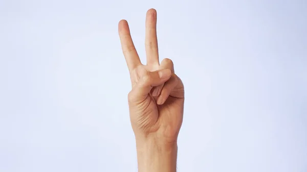 Two Fingers Hand Raised Symbol Victory Popular Famous Hand Gesture Stock Image