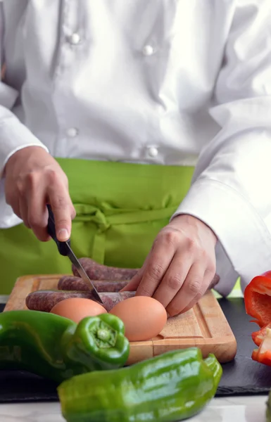 Chef cutting vegetables — Stock Photo, Image