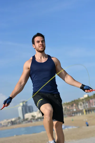 Athlete jumping rope in the city — Stock Photo, Image