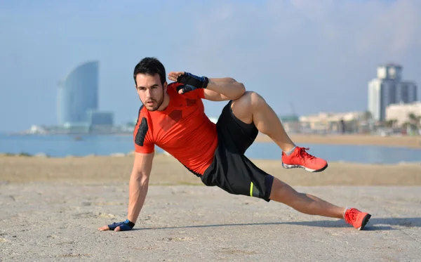 Athlete practicing exercises of calisthenics — Stock Photo, Image