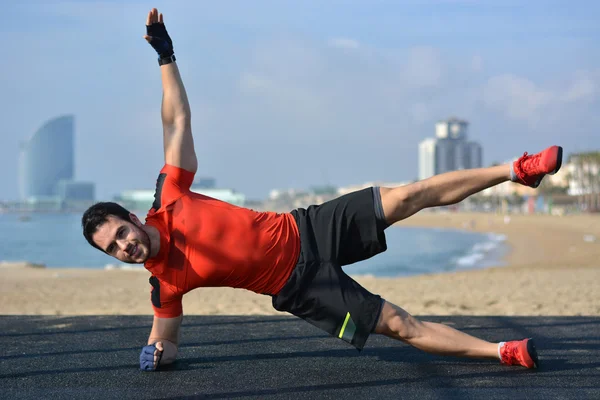 Athlete practicing exercises of calisthenics — Stock Photo, Image