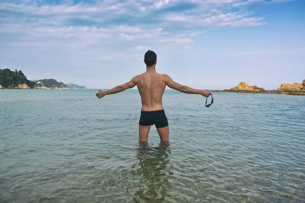 Entrenamiento de nadador en la playa —  Fotos de Stock