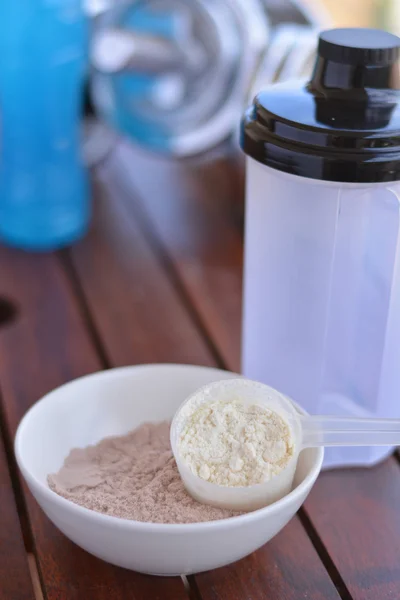 Whey protein taste vanilla and chocolate — Stock Photo, Image