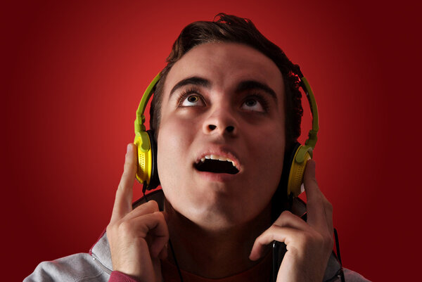 youn man listening to music 