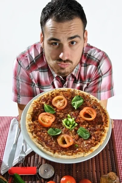 Szalony człowiek głodny jedzenie pizzy — Zdjęcie stockowe