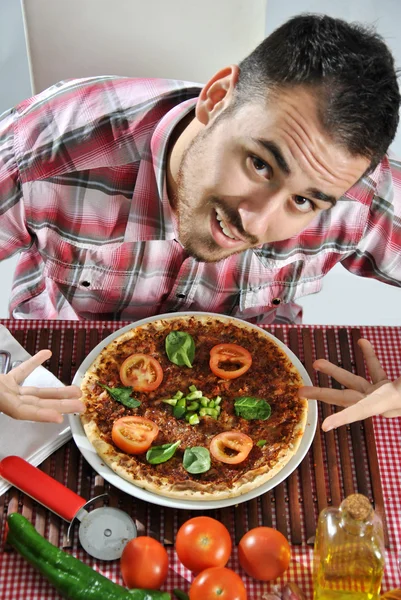 Crazy hungry man eating pizza — Stock Photo, Image