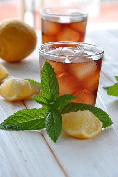 Glasses of ice tea with mint — Stock Photo, Image